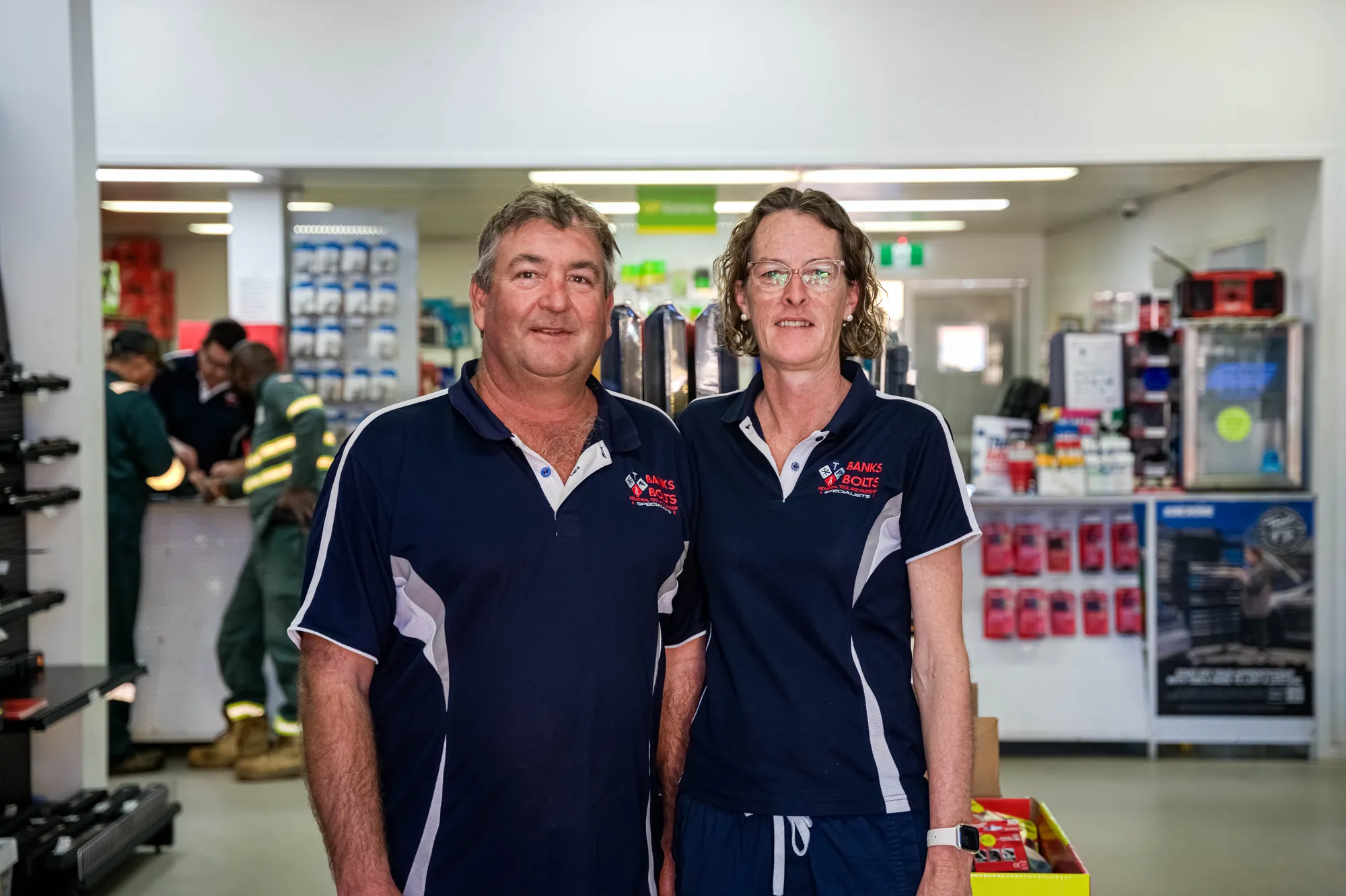 Two of the Banks Bolts team standing together in the store