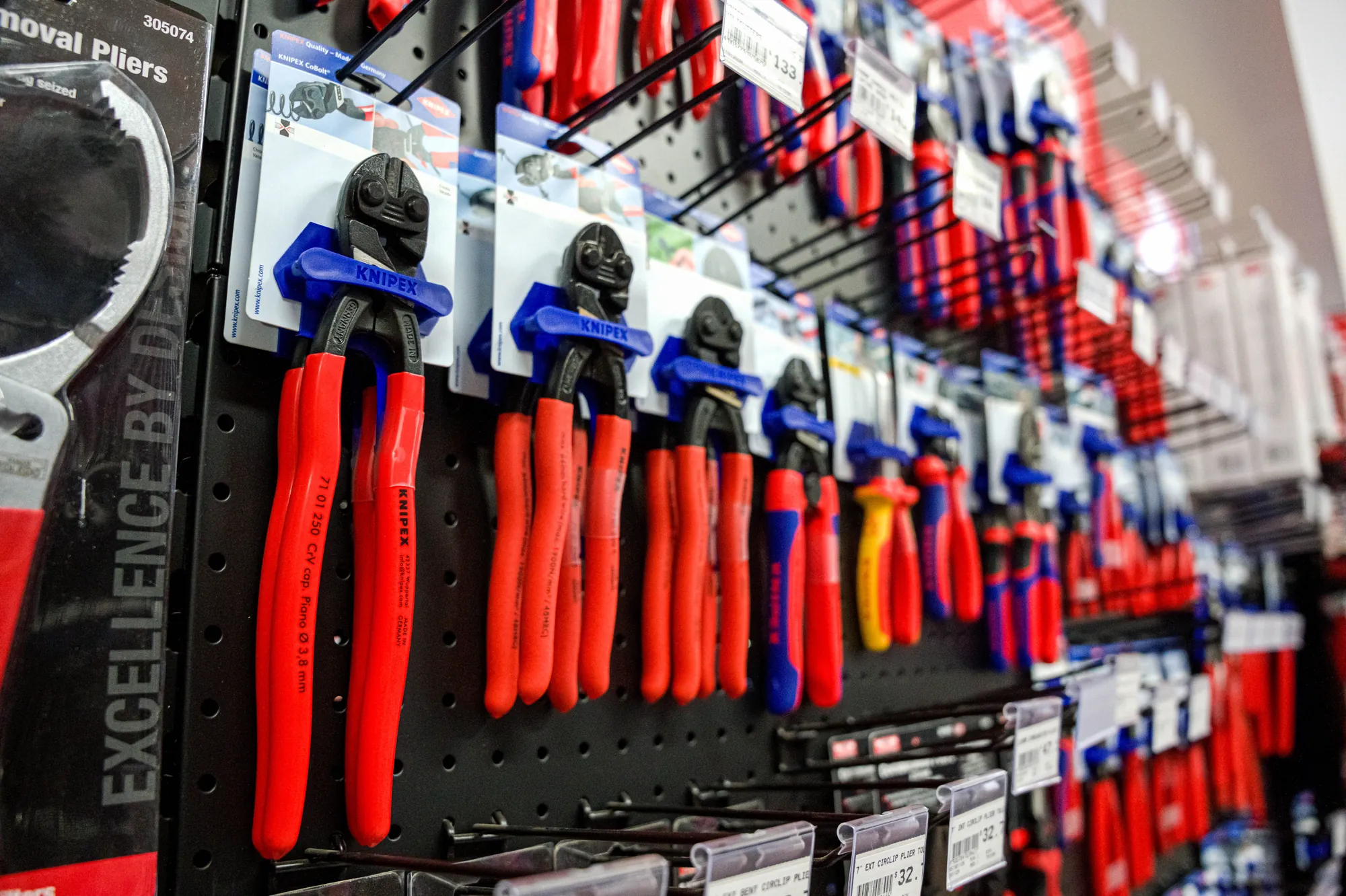 Wall of pliers and cutters in the store