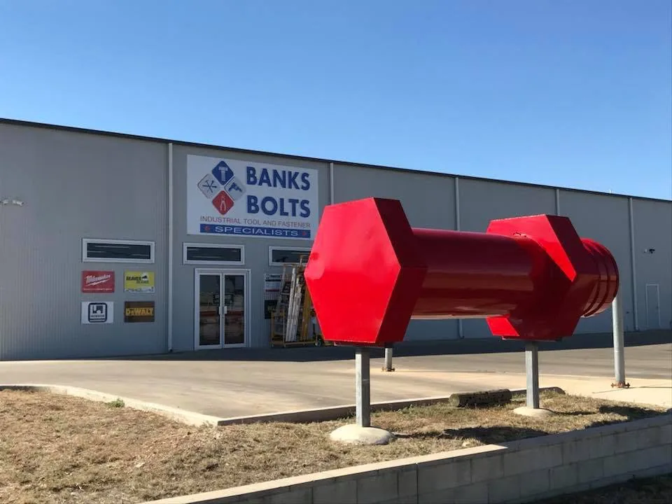 Banks Bolts & Fasteners store at 87 Raglan St, Roma with the big red bolt out front Banks Bolts & Fasteners store at 87 Raglan St, Roma with the big red bolt out front